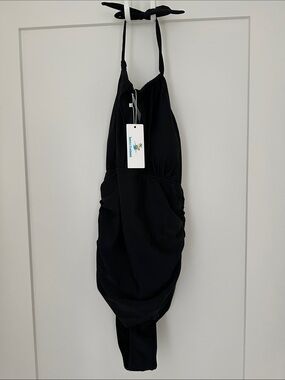 New with tags Black one piece swimsuit size XL.